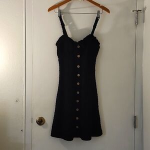 No Boundaries Black W Faux Buttons in front from top to bottom.